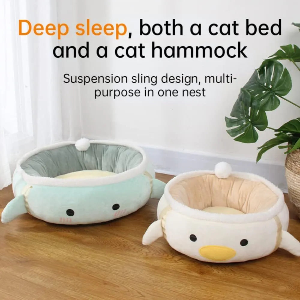 Green chick dinosaur shaped cat bed shown both flat and hanging as a hammock.