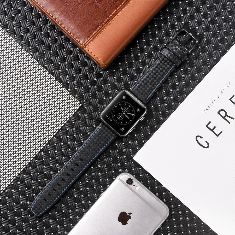 Leather Apple Watch strap with carbon fibre pattern in black, blue, orange, or red colours for 38mm 40mm or 42mm 44mm cases.