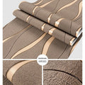 Close-up of dark brown curve stripe 3D velvet texture decorative wallpaper roll