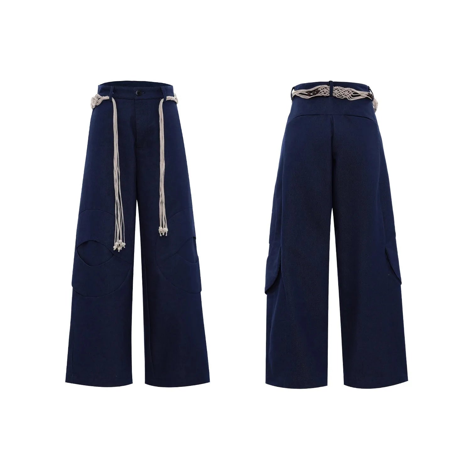 Man wearing dark grey straight-leg cotton trousers with a tassel detail and loose fit.