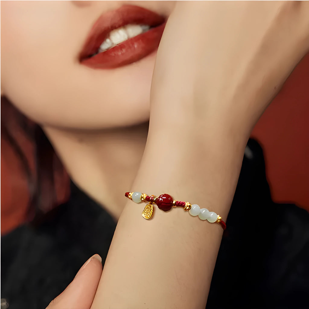 Adjustable 925 silver women's bracelet with Hetian jade bead and cinnabar red rope in shore colour
