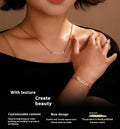 Stainless steel digital bracelet or necklace with diamond-set bezel showing time display, in gold, rose gold, or steel finish.