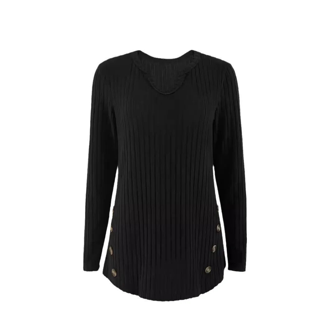 Simple solid colour knitted button sweater on hanger showing regular sleeves and button details