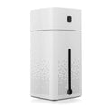 Black or white desktop humidifier measuring 103mm by 103mm by 218mm with USB cable