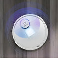 Automatic sweeping floor cleaner robot with compact black ABS body on a wooden floor.