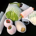 White foam net protective cover for fruit packing with hybrid shockproof design
