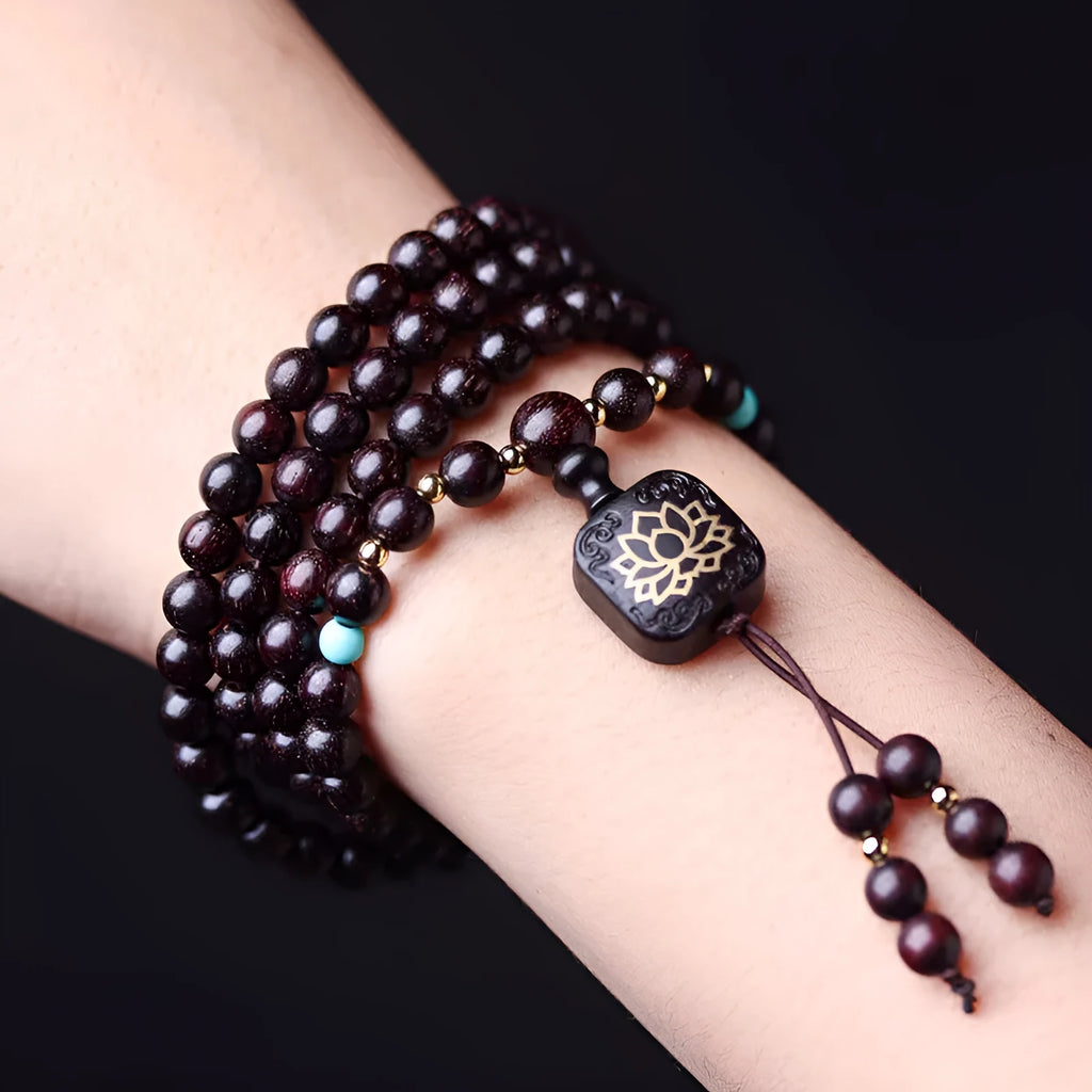 Zambia rosewood Buddha beads bracelet with flat lotus pendant showing 108 beads