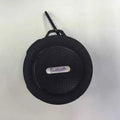 Portable waterproof Bluetooth speaker in multiple colours with a built-in carabiner clip for bags.