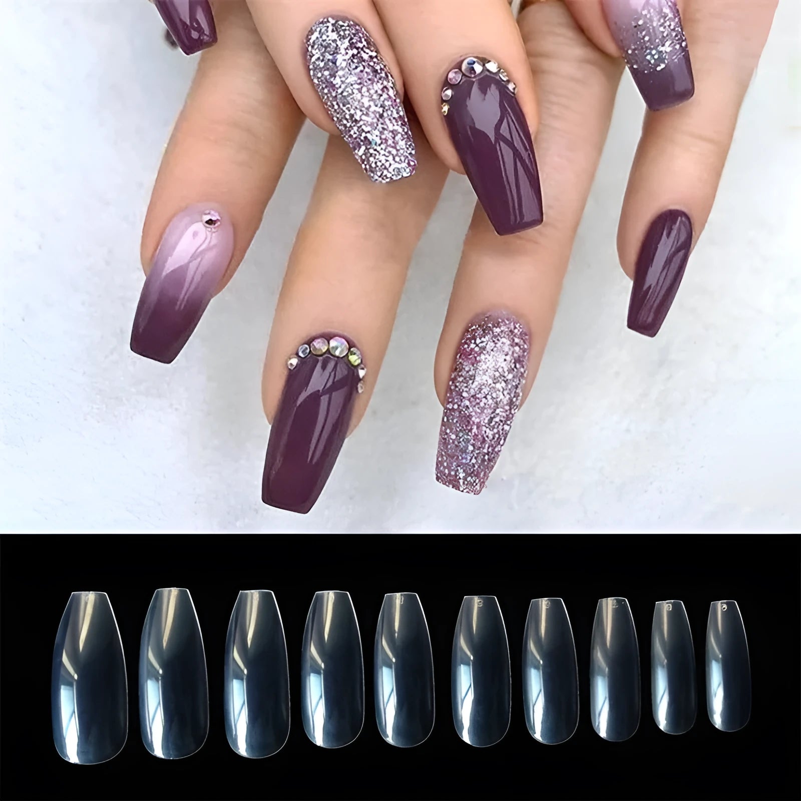 500 clear and natural ABS acrylic false nails in 10 sizes spread on a table