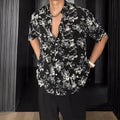 Men's loose fit casual shirt with floral pattern and short sleeves in black or white