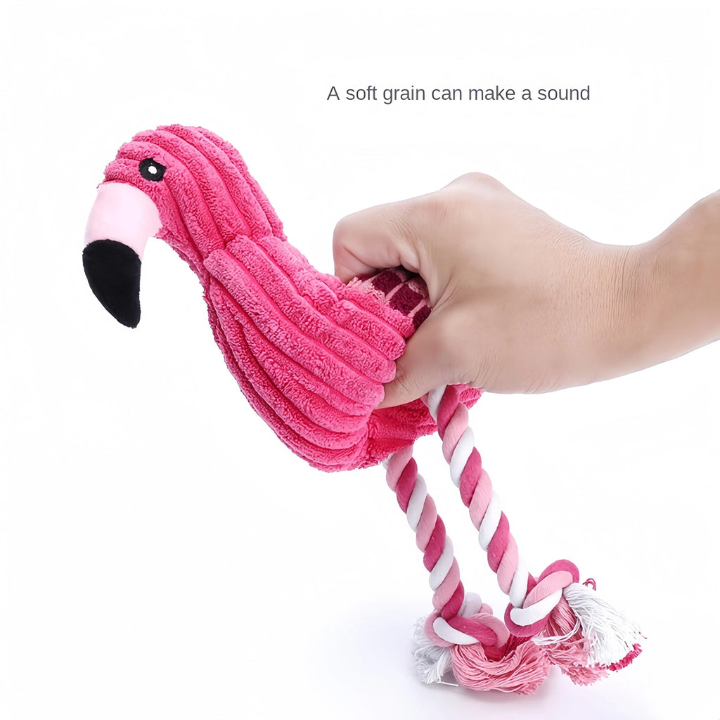 Pink animal-shaped plush dog toy with corduroy material and squeaker inside