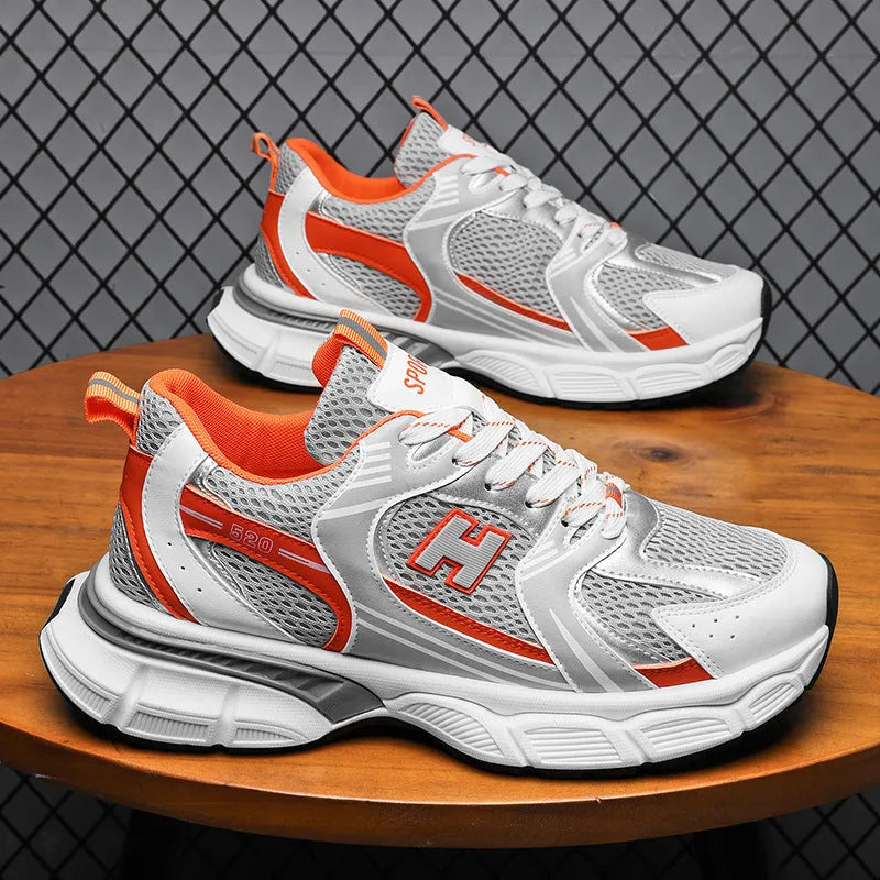 Men's mesh casual running shoes in black, white orange, and white grey with round toe and plastic soles