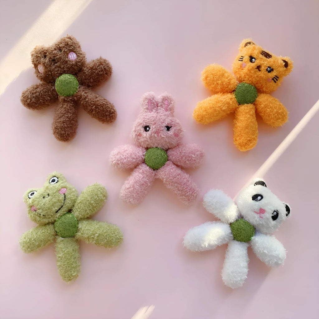 Soft stuffed catnip ball toy in animal design for chewing and play.