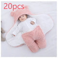 Quilted baby sleeping bag wrapper in light blue, showing size and cotton blend fabric texture.