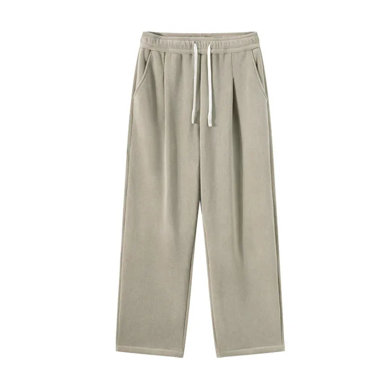 Men's apricot double-sided polar fleece casual trousers with a drawstring waistband, shown laid flat.