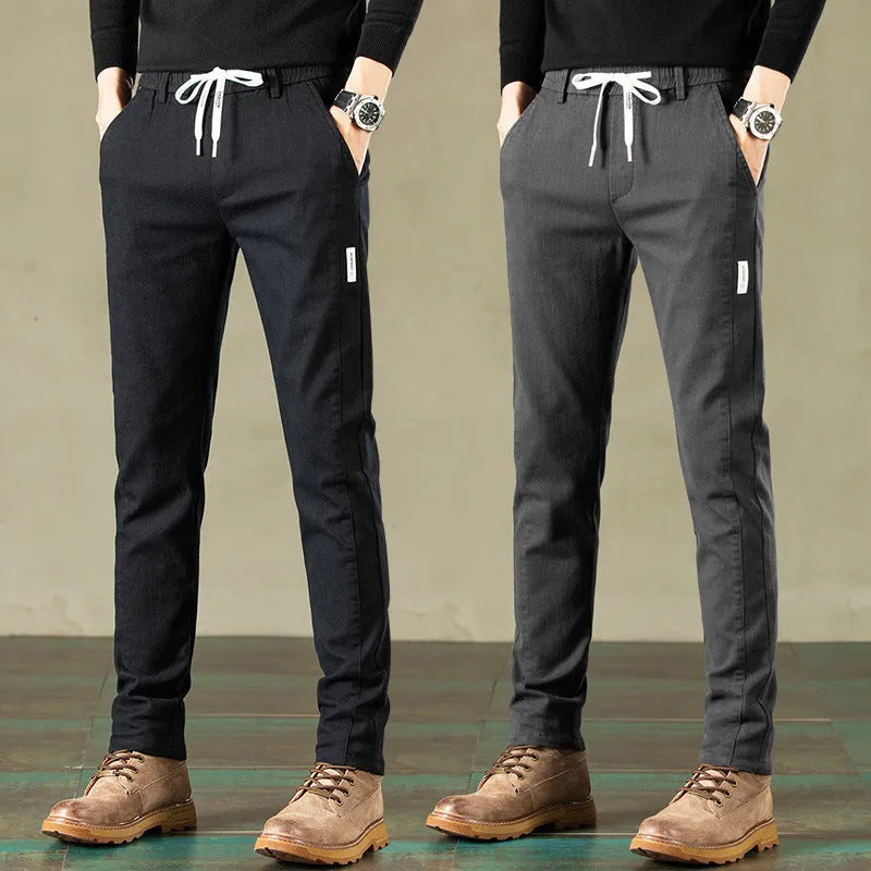 Loose straight cotton casual pants in solid colour with mid waist drawstring, sizes 28-38