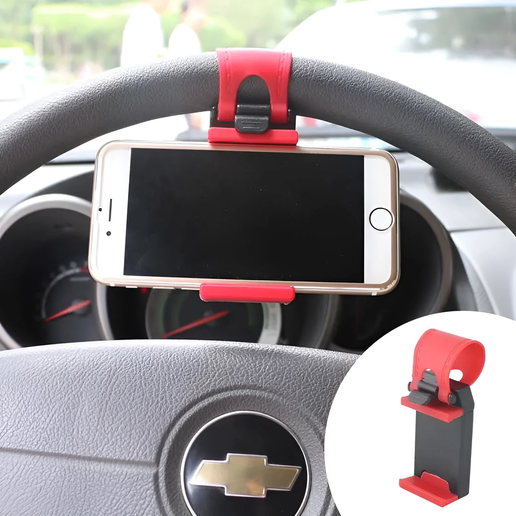 Black steering wheel phone holder mounted showing elastic clip and silicone phone padding
