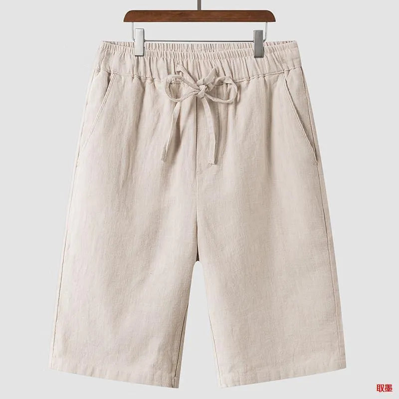 Men's loose-fit linen shorts in cropped length with elastic waistband