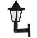 Black hexagonal solar wall lamp for outdoor garden or patio mounting