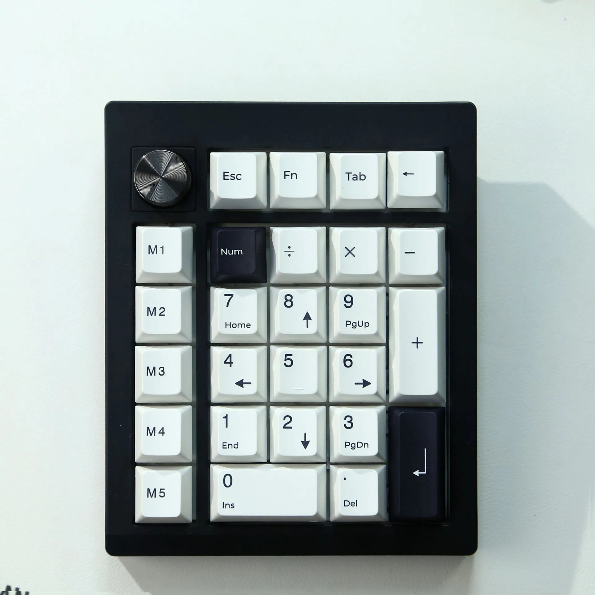 Black and white wireless mechanical numeric keyboard with Bluetooth connectivity