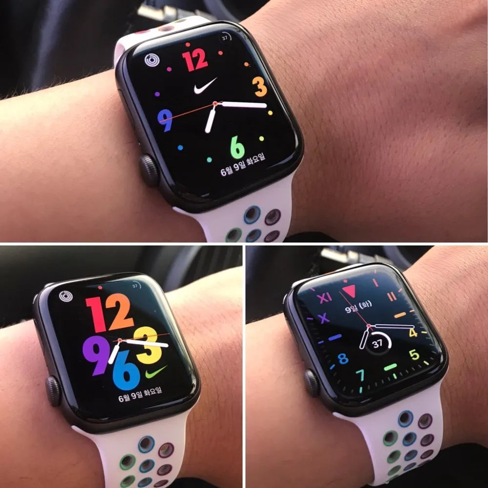 Adjustable silicone sports wristband in black, white, or rainbow colours with a single buckle.