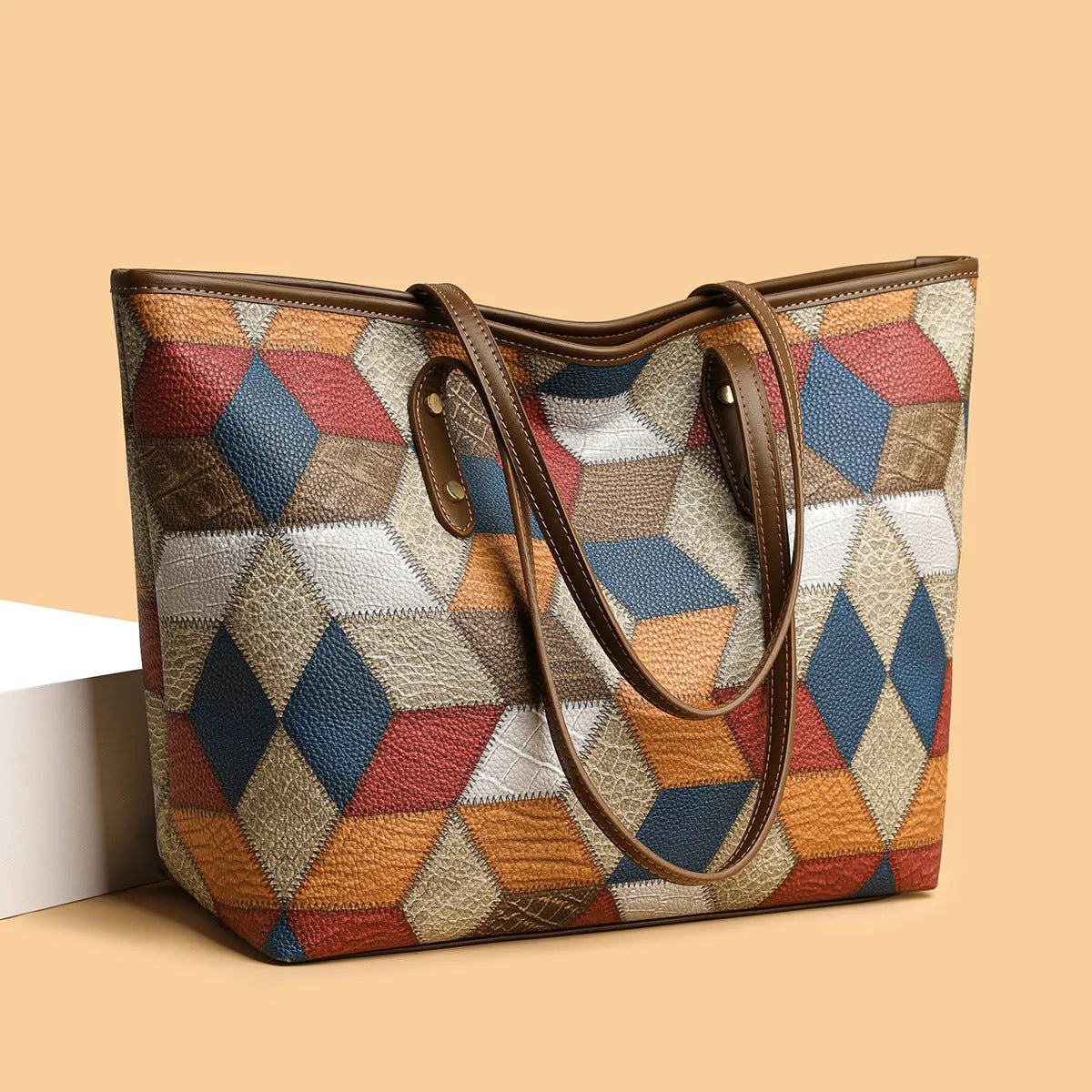 Women's PVC shoulder bag with sandwich pocket organisation in blue brown colour