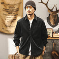 Men's black corduroy casual shirt jacket with long sleeves and a loose fit.