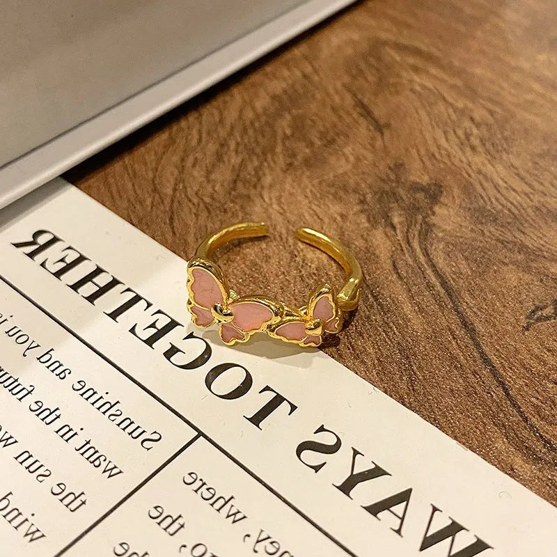 Copper women's butterfly ring with Chinese design in a simple style.