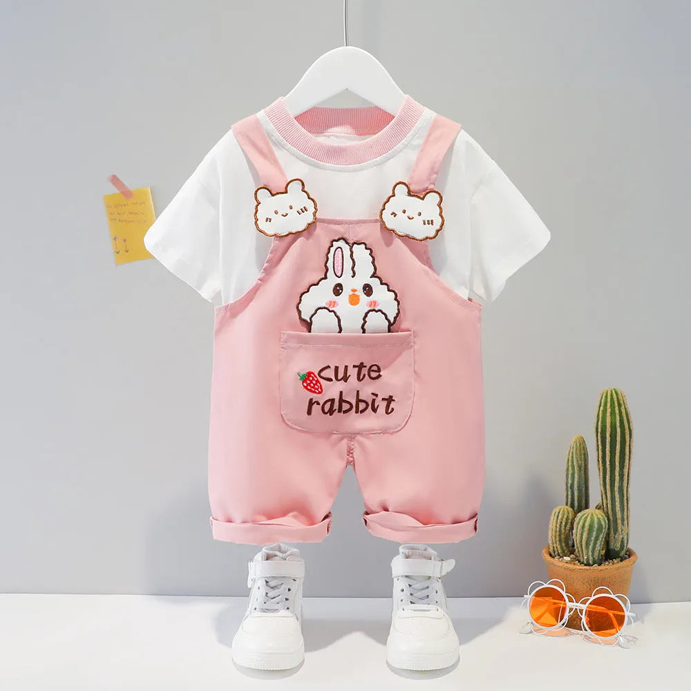 Baby wearing cotton summer overalls with cartoon print and adjustable straps