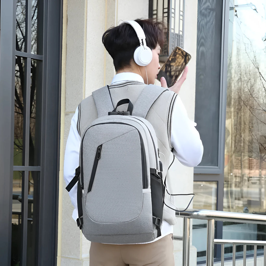 Oxford cloth computer backpack in blue, showing front view with dimensions 50cm high by 19cm wide.