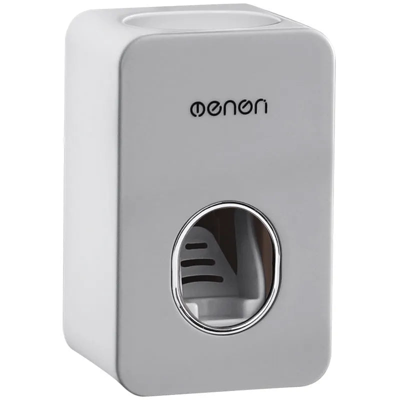 White and grey wall mounted automatic toothpaste dispenser with toothbrush rack, shown in grey, green and pink colour options.