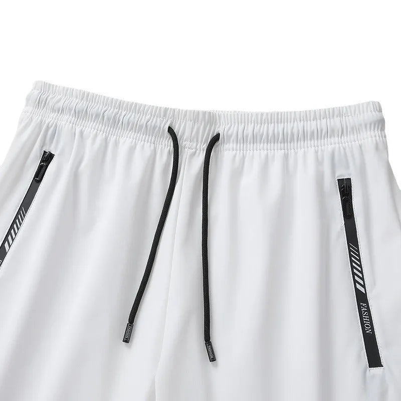 Men's quick-drying nylon sports shorts in loose fit style available in multiple sizes and colours