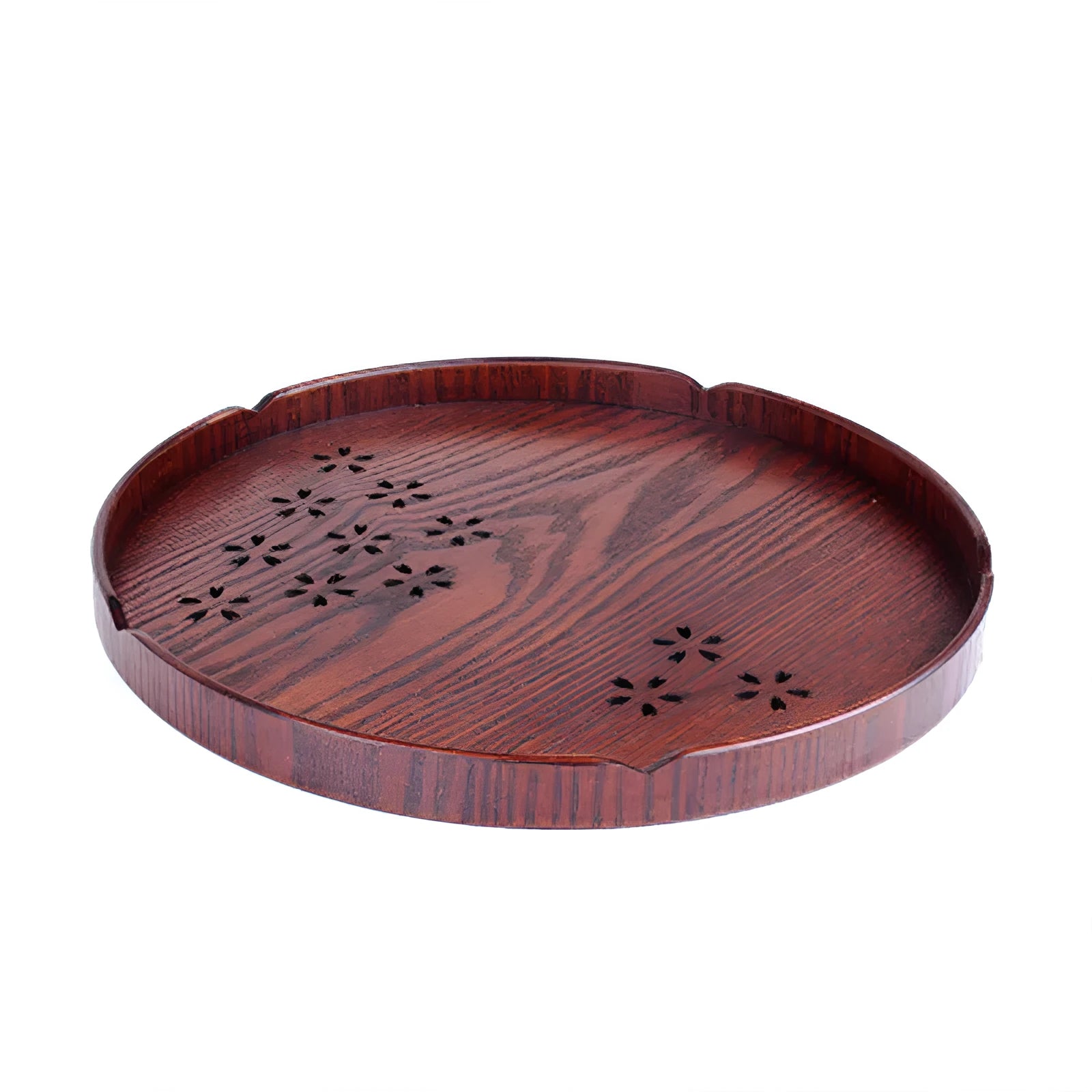 Wooden circular serving platter with 12 round compartments and a central carved cherry blossom (sakura) design.