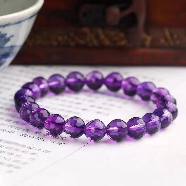 128-facet crystal ametrine bracelet with zodiac designs in multiple bead sizes