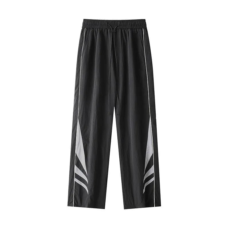 Men's straight-leg loose fit sports trousers in grey fabric with an elasticated waistband.