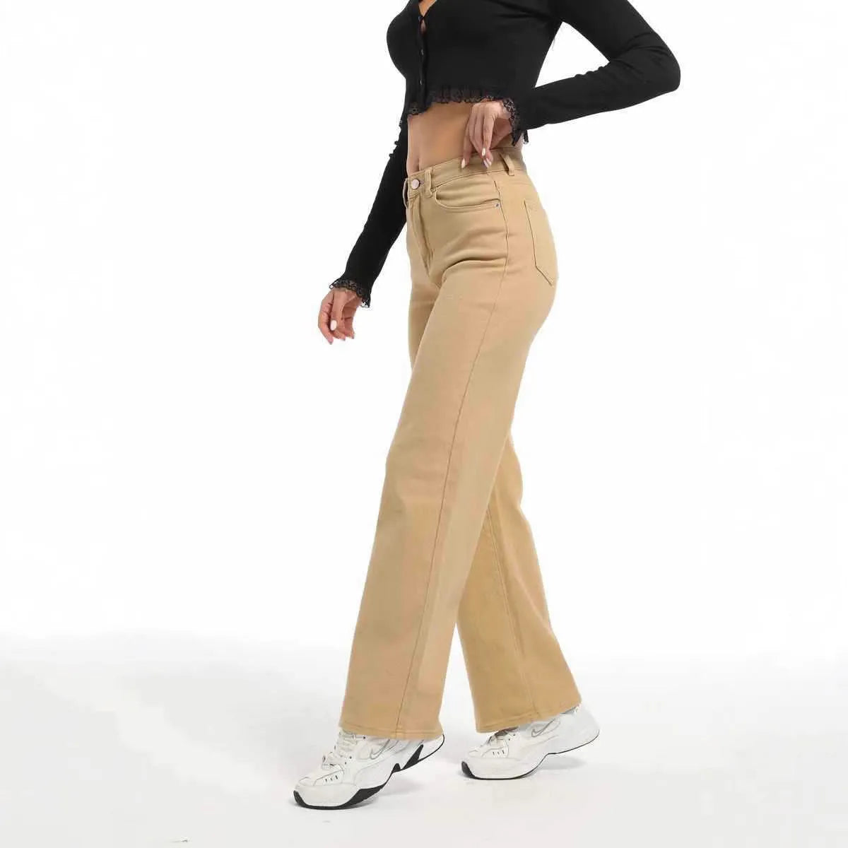 Women's apricot wide leg high waist jeans with straight cut on a hanger
