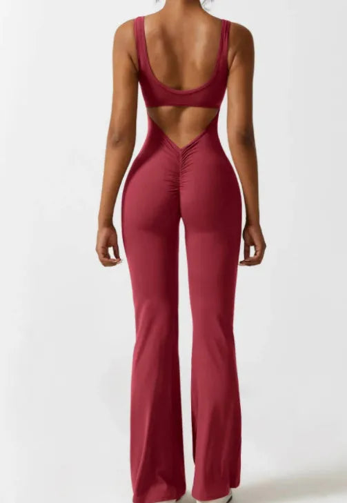 Black tight seamless yoga bodysuit on a mannequin, showing mid waist and trousers length.