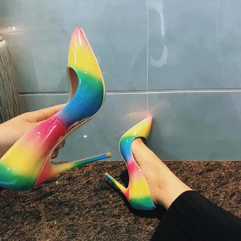 Rainbow colour patent leather women's high heels with pointed toe and thin ultra-high heel.