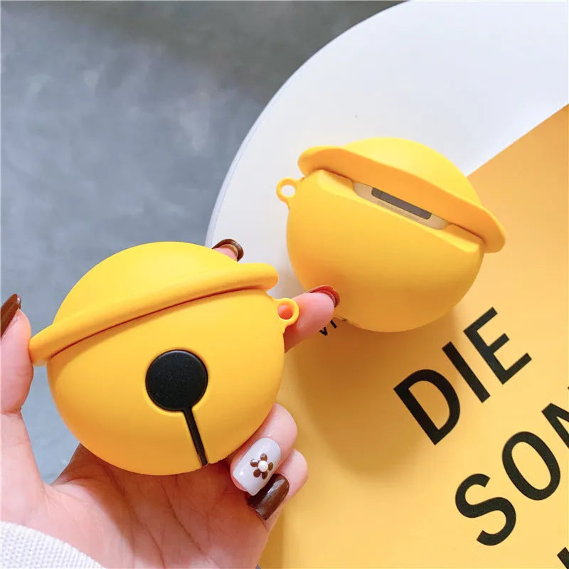 Yellow silicone case with a bell charm and keyring for Apple AirPods 1 and 2 generation.
