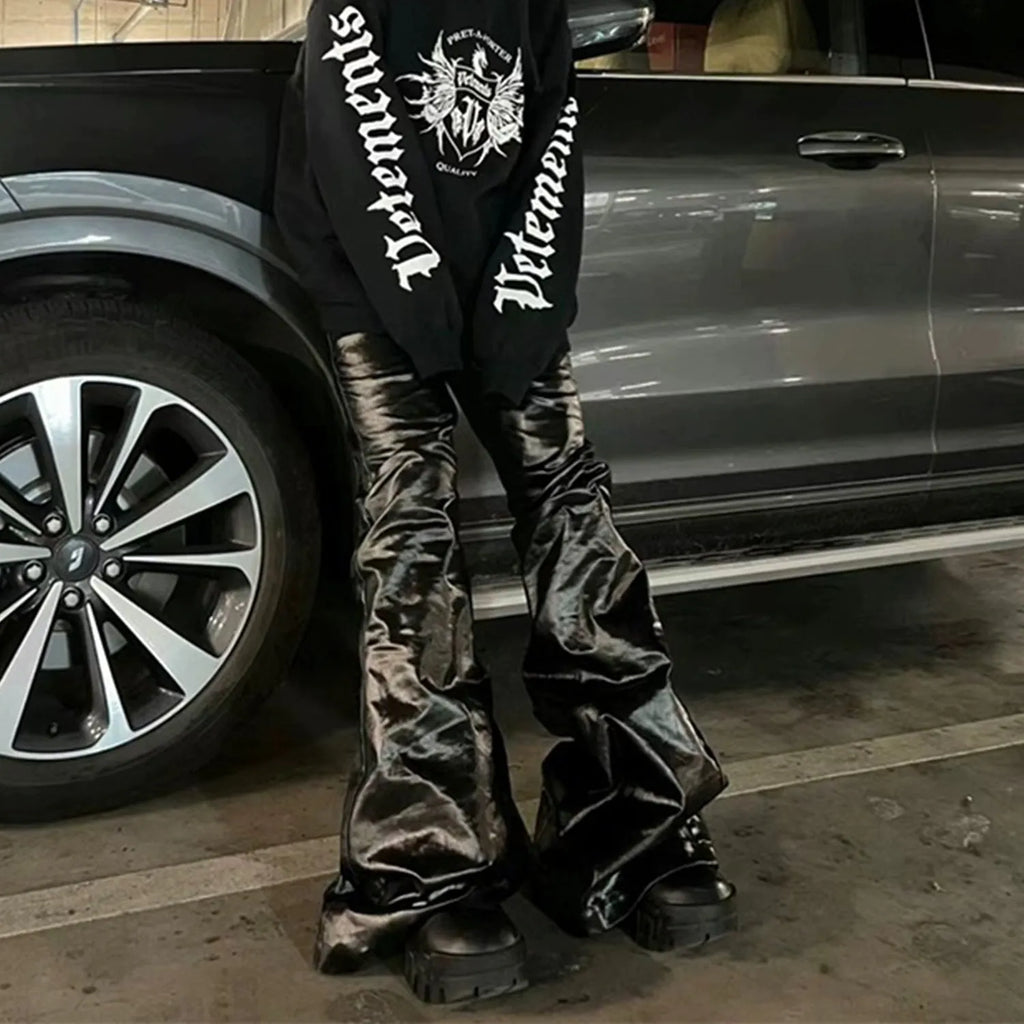 Black shiny patent leather effect skinny jeans with a straight leg and mid waist.