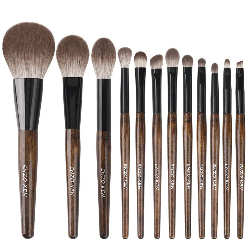 12-piece makeup brush set with wooden handles and PU storage bag displayed