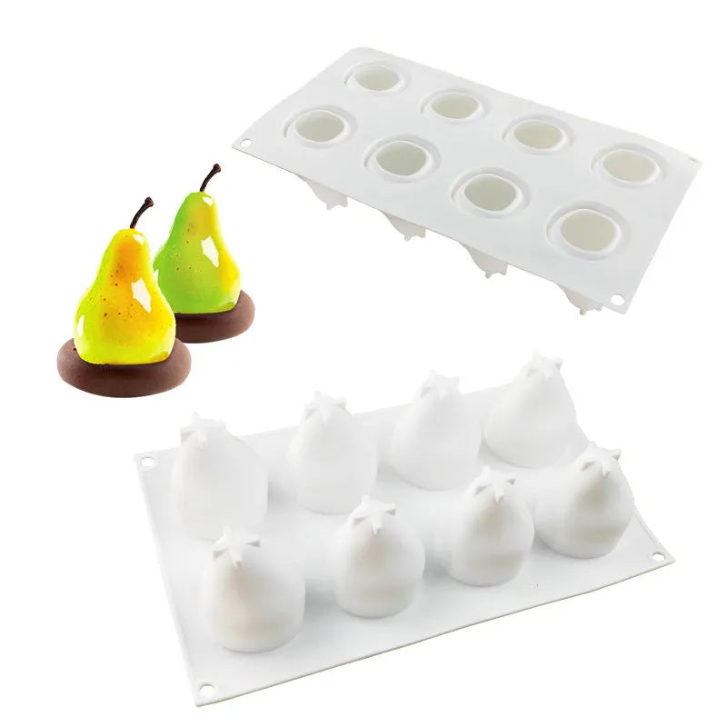 Silicone baking mould with six cavities shaped like pineapples, pine cones, and pears for making mousse desserts.
