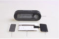 Black electronic car clock thermometer with digital LED display showing time and temperature, featuring an adjustable base.