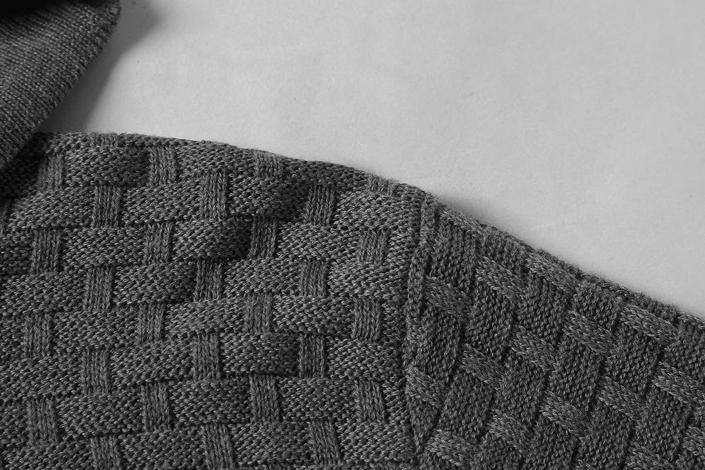 Men's black hooded sweatshirt made from cotton and polyester blend fabric on a grey background.