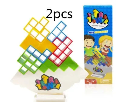 Plastic balance stacking board game with colourful blocks, chassis, and base on table