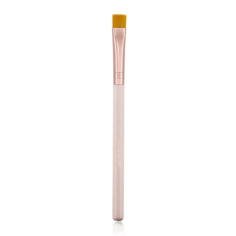26-piece pink makeup brush set with wooden handles and a grey PU storage case, arranged open.