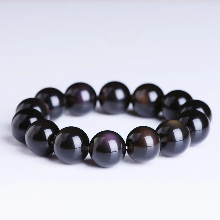 Crystal natural icy obsidian Pi Xiu bracelet with geometric ethnic design on wrist