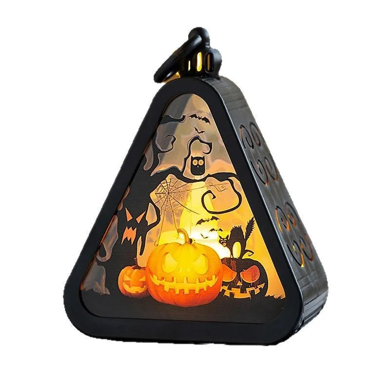 Portable Halloween pumpkin lamp decoration measuring 8.9cm with four colour designs