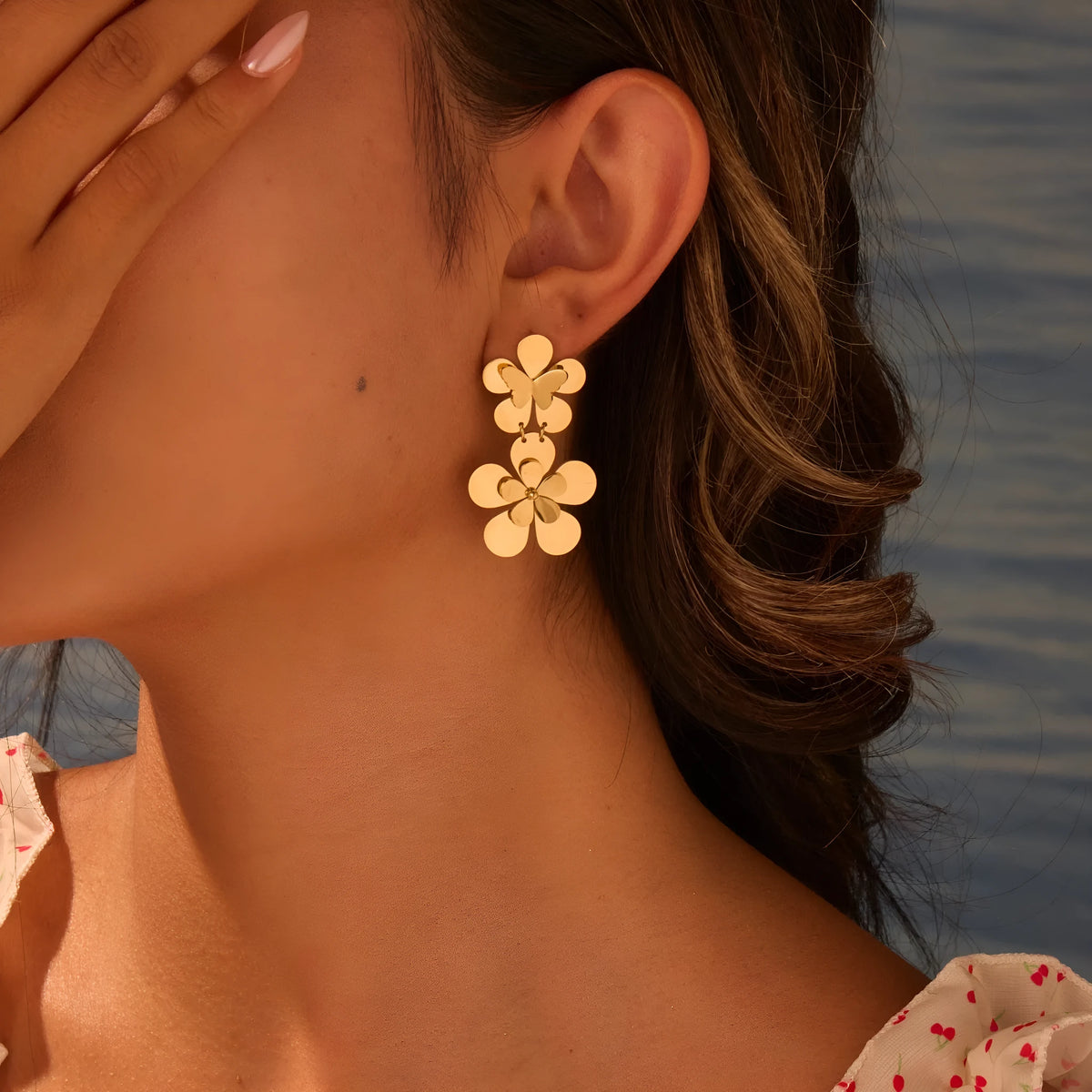 Gold-coloured stainless steel earrings with floral and butterfly design for women