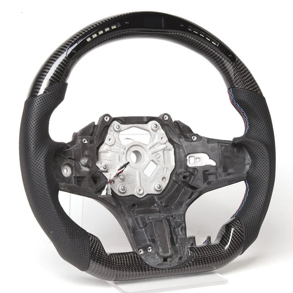 Black carbon fibre LED sports steering wheel for BMW X3 and X5 vehicles